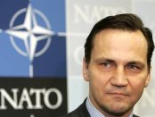 Poland's Foreign Minister Radoslaw Sikorski addresses a news conference after a meeting with Russia's Foreign Minister Sergei Lavrov following a NATO foreign ministers meeting at the Alliance's headquarters in Brussels December 7, 2007.  REUTERS/Thierry Roge (BELGIUM)